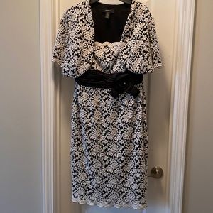 R&M Richards size 8 fully lined dress. 40 inches in length.
